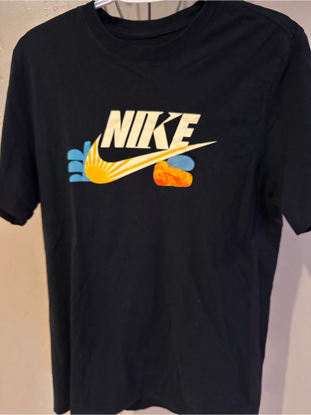 Nike Black Short Sleeve Graphic Logo Tee with Yellow & Blue Accents